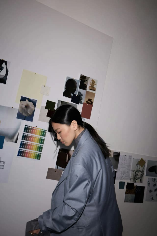A moodboard of a room with a laptop and a phone